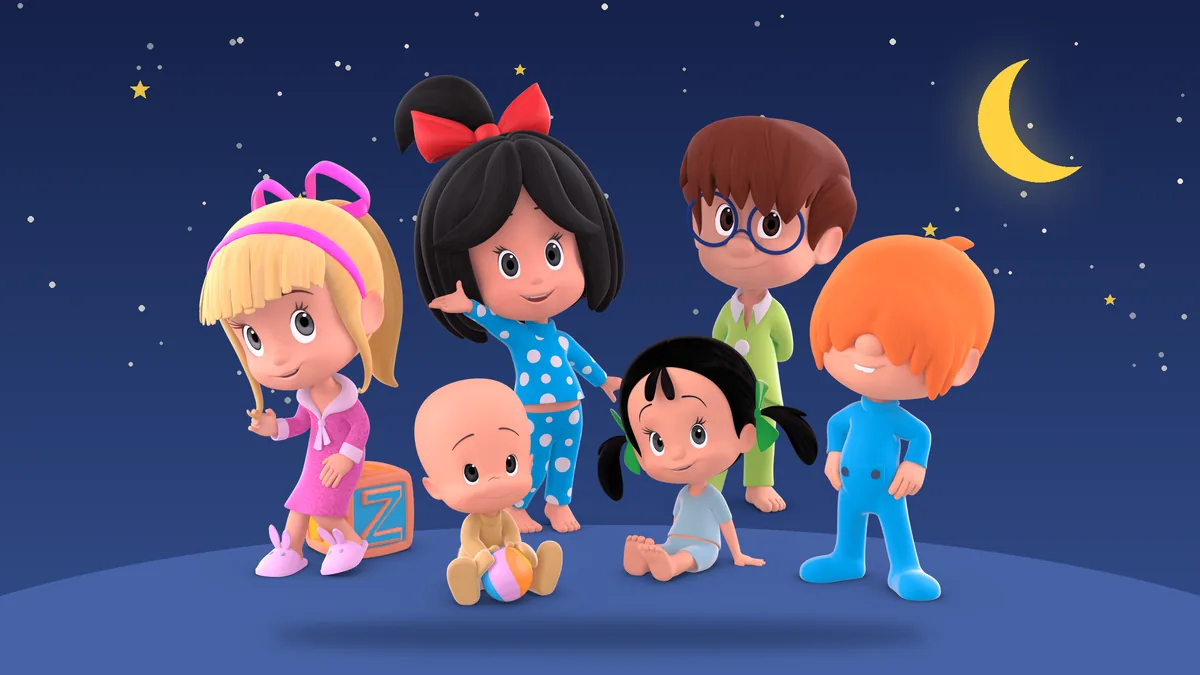 Cleo, Cuquín y sus hermanos en pijama bajo un cielo de estrellas